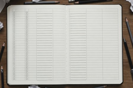 Notebook page tracking numerical variables and boolean flags across story chapters