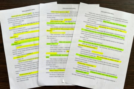 Printed story script with yellow and lime highlights marking expectation gaps after a choice